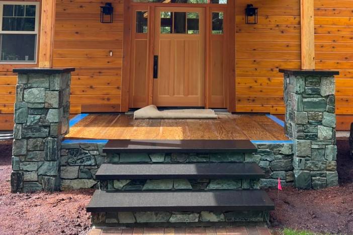Installation of Black Basalt Capstones and stair treads